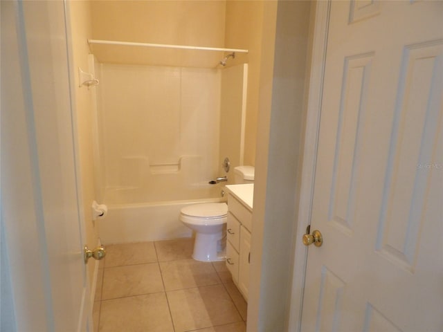 3074 Bay Laurel Cir N, Kissimmee, FL 34744 - bathroom with vanity, tile patterned floors, toilet, and tub / shower combination