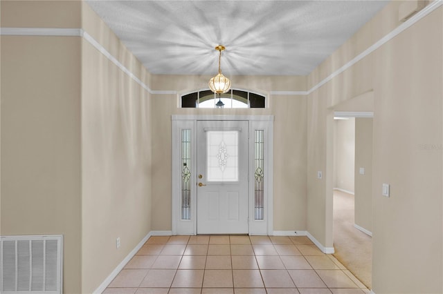 4065 Kingsley St, Clermont, FL 34711 - tiled foyer featuring baseboards