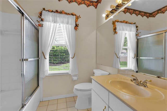 4065 Kingsley St, Clermont, FL 34711 - full bath with tile patterned flooring, vanity, and enclosed tub / shower combo