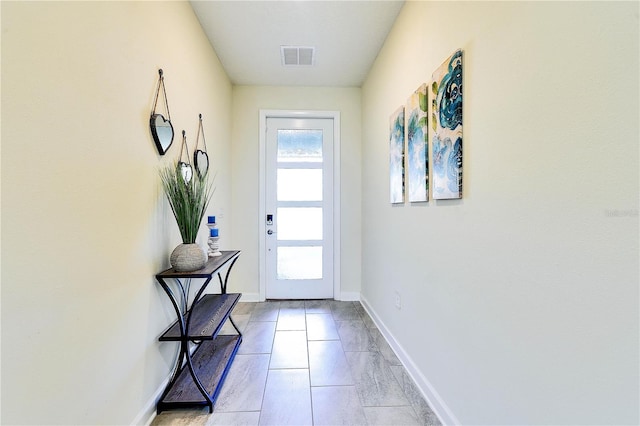 8974 Cabot Cliffs Dr, Davenport, FL 33896 - doorway featuring baseboards