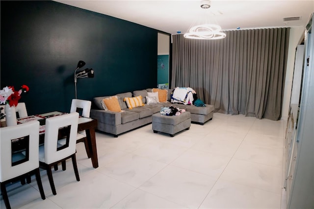 153 Taft Dr, Davenport, FL 33837 - living room featuring a chandelier