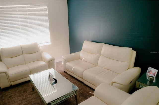 153 Taft Dr, Davenport, FL 33837 - carpeted living area with baseboards