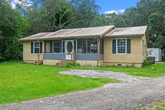 5381 Avocado Ave, Cocoa, FL 32926 - single story home featuring crawl space, metal roof, and a sunroom