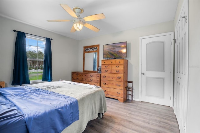5381 Avocado Ave, Cocoa, FL 32926 - bedroom with light wood-style floors and ceiling fan