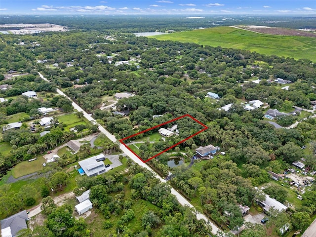 5381 Avocado Ave, Cocoa, FL 32926 - aerial view of property and surrounding area featuring property parcel outlined and a nearby body of water