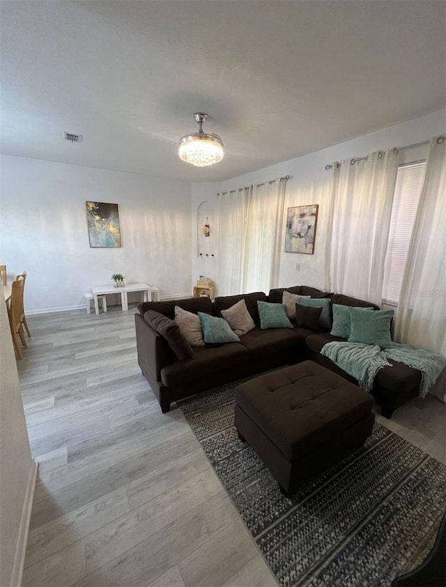 615 Terra Lago St, Davenport, FL 33897 - living room with light wood-style flooring and baseboards