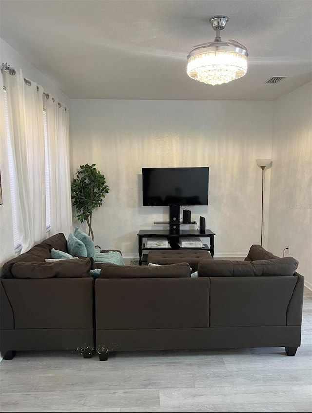 615 Terra Lago St, Davenport, FL 33897 - living room with light wood-style floors and baseboards