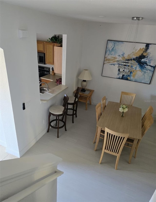 615 Terra Lago St, Davenport, FL 33897 - dining area with baseboards