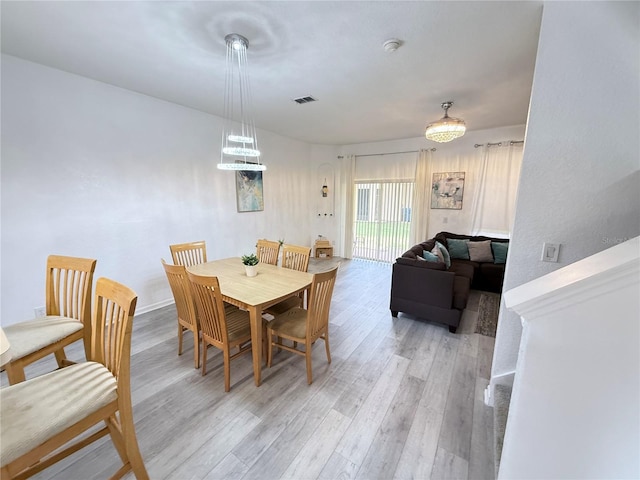 615 Terra Lago St, Davenport, FL 33897 - dining room featuring light wood-type flooring