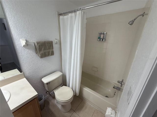615 Terra Lago St, Davenport, FL 33897 - full bathroom with a textured wall, vanity, shower / bath combo, and tile patterned floors