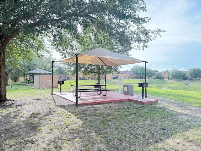 615 Terra Lago St, Davenport, FL 33897 - surrounding community featuring a shed, a yard, and a deck with water view