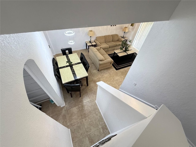 324 Palermo St, Davenport, FL 33897 - tiled living area featuring a textured wall
