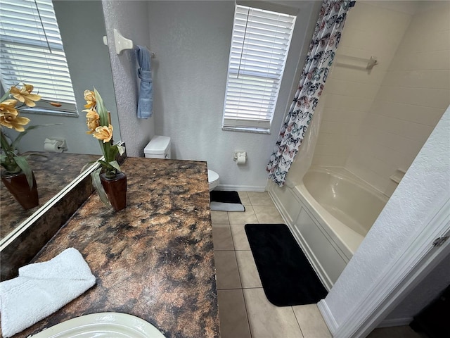 324 Palermo St, Davenport, FL 33897 - bathroom featuring tile patterned floors, shower / bath combo, a textured wall, and vanity