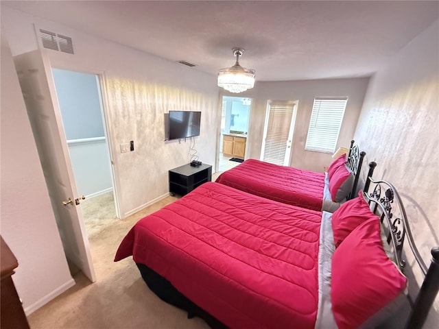 324 Palermo St, Davenport, FL 33897 - carpeted bedroom featuring baseboards and ensuite bathroom