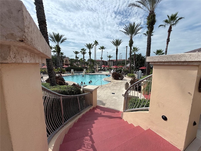 324 Palermo St, Davenport, FL 33897 - community pool featuring a patio area