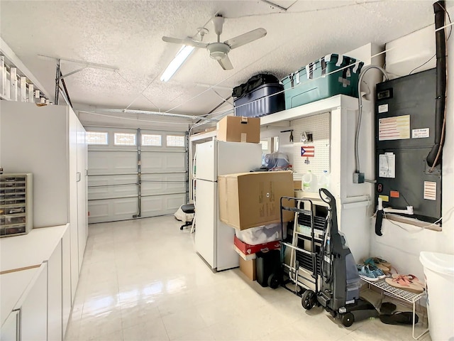 624 Royal Palm Dr, Kissimmee, FL 34743 - garage with freestanding refrigerator and a ceiling fan