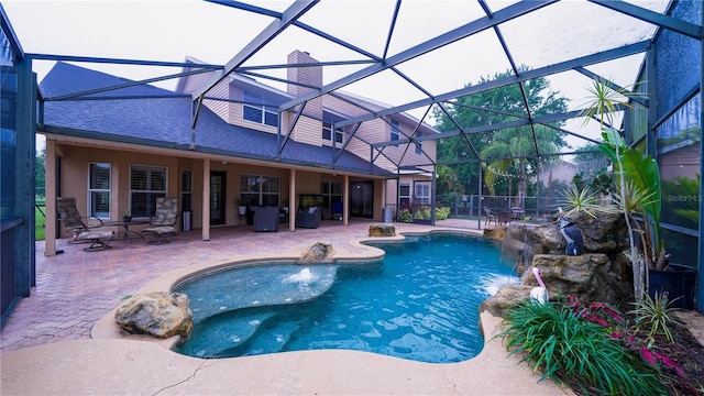 2851 Granada Blvd, Kissimmee, FL 34746 - outdoor pool with a patio area and glass enclosure