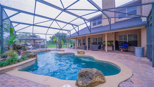 2851 Granada Blvd, Kissimmee, FL 34746 - swimming pool featuring a patio area, an outdoor hangout area, and a lanai