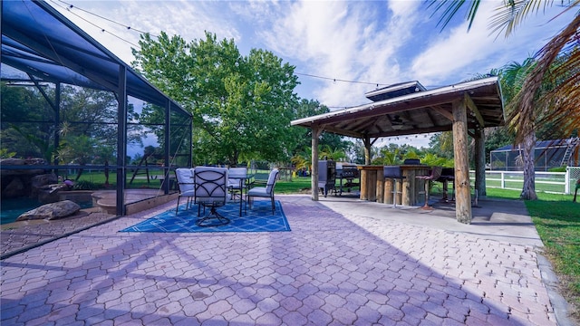 2851 Granada Blvd, Kissimmee, FL 34746 - view of patio / terrace with a gazebo and glass enclosure
