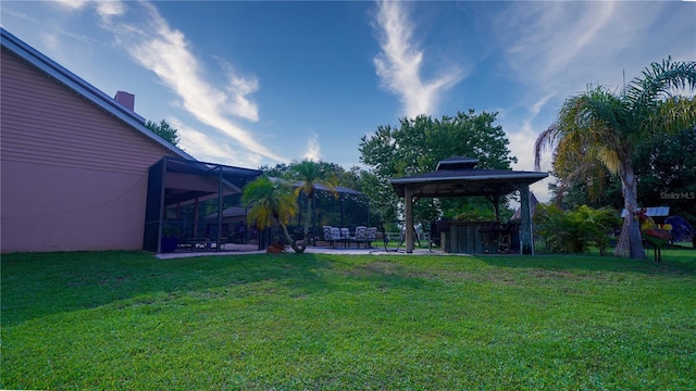 2851 Granada Blvd, Kissimmee, FL 34746 - view of green lawn featuring a gazebo and a patio