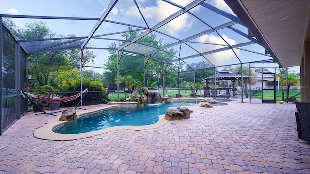 2851 Granada Blvd, Kissimmee, FL 34746 - swimming pool with a patio, a gazebo, and glass enclosure