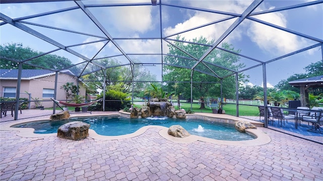 2851 Granada Blvd, Kissimmee, FL 34746 - outdoor pool featuring a patio and glass enclosure