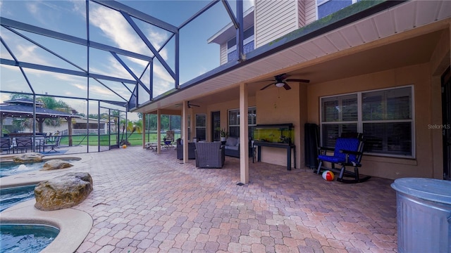 2851 Granada Blvd, Kissimmee, FL 34746 - view of patio / terrace with ceiling fan, a lanai, and outdoor dining space