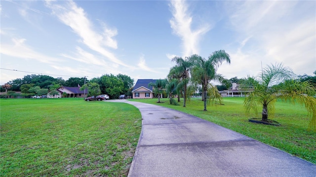 2851 Granada Blvd, Kissimmee, FL 34746 - view of community with driveway and a lawn