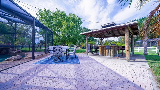 2851 Granada Blvd, Kissimmee, FL 34746 - view of patio featuring a gazebo and glass enclosure