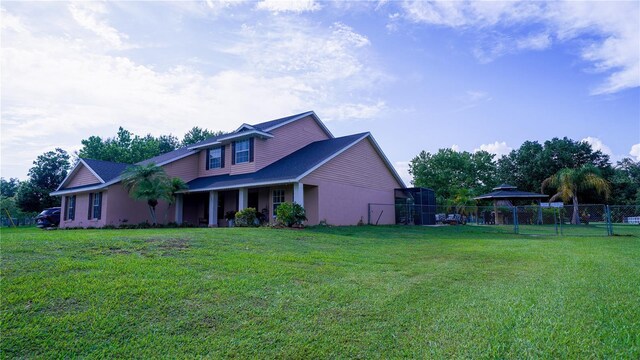 2851 Granada Blvd, Kissimmee, FL 34746 - view of side of property with a gazebo and stucco siding