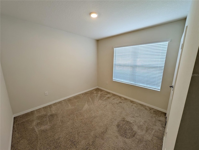 2479 White Lilly Dr, Kissimmee, FL 34747 - spare room with carpet floors and baseboards