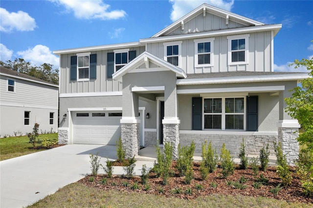 555 Summit River Dr, Apopka, FL 32712 - craftsman inspired home featuring board and batten siding, stone siding, and an attached garage
