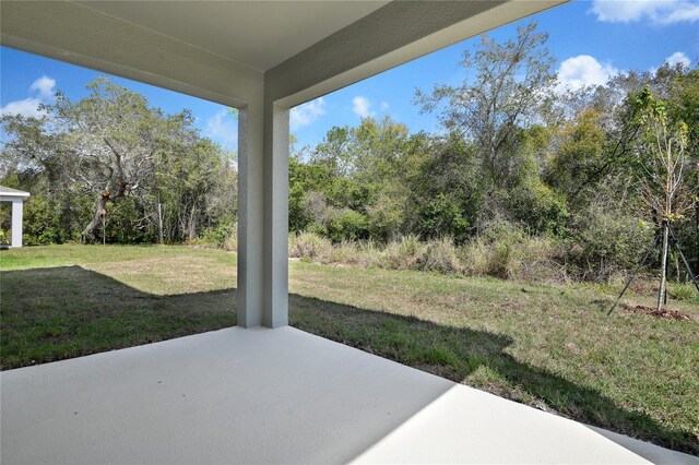 555 Summit River Dr, Apopka, FL 32712 - view of patio / terrace featuring view of wooded area