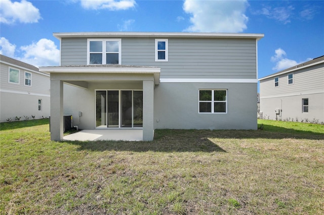 555 Summit River Dr, Apopka, FL 32712 - back of house with a patio, stucco siding, and a yard