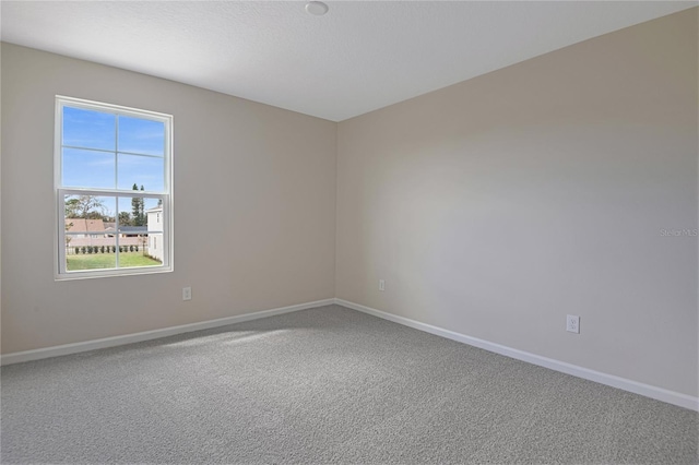 565 Summit River Dr, Apopka, FL 32712 - spare room featuring baseboards and carpet