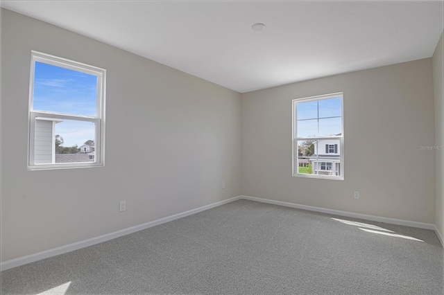 565 Summit River Dr, Apopka, FL 32712 - empty room featuring baseboards and carpet