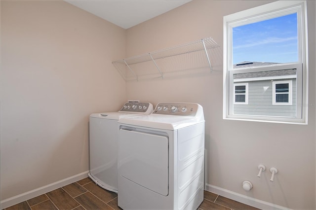 565 Summit River Dr, Apopka, FL 32712 - washroom featuring wood tiled floors, washing machine and dryer, and baseboards