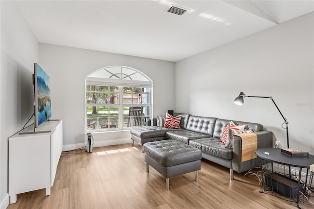 2700 Palm Isle Way, Orlando, FL 32829 - living area with light wood-style floors and baseboards