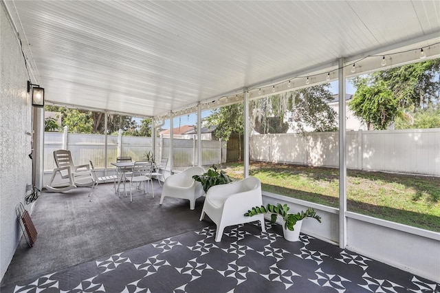 2700 Palm Isle Way, Orlando, FL 32829 - sunroom with outdoor dining area