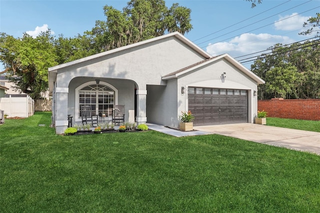 2700 Palm Isle Way, Orlando, FL 32829 - ranch-style home with stucco siding, a porch, a garage, and concrete driveway