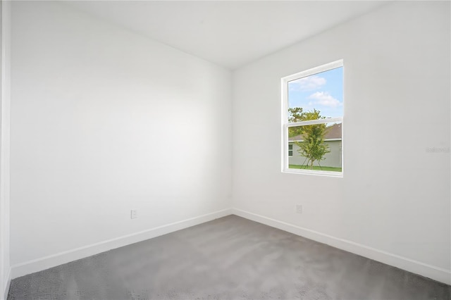 9127 Players Dr, Weeki Wachee, FL 34613 - carpeted empty room featuring baseboards