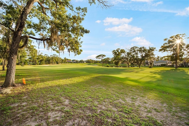 9127 Players Dr, Weeki Wachee, FL 34613 - view of property's community featuring a lawn and view of golf course
