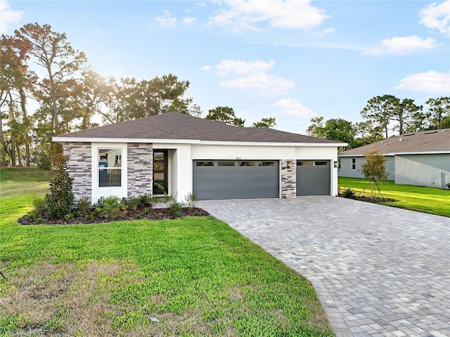 9127 Players Dr, Weeki Wachee, FL 34613 - view of front of property with decorative driveway, a front lawn, a garage, and stone siding
