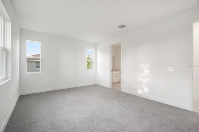 9127 Players Dr, Weeki Wachee, FL 34613 - empty room with carpet floors and baseboards