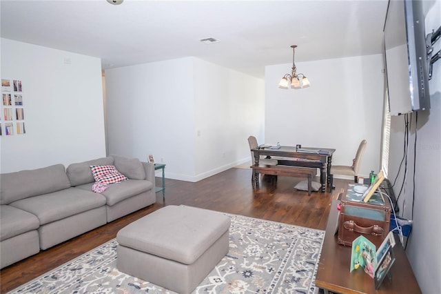 2268 Victoria Falls Dr, Orlando, FL 32824 - living area featuring a chandelier and wood finished floors