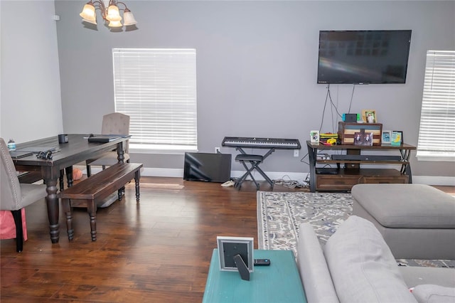 2268 Victoria Falls Dr, Orlando, FL 32824 - living area with wood finished floors and a chandelier