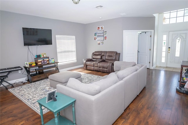 2268 Victoria Falls Dr, Orlando, FL 32824 - living room with healthy amount of natural light and wood finished floors