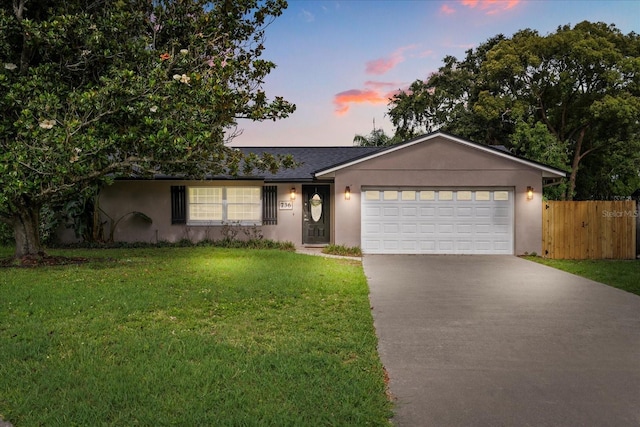 736 Forest Glen Ct, Maitland, FL 32751 - ranch-style home with driveway, stucco siding, an attached garage, and a shingled roof