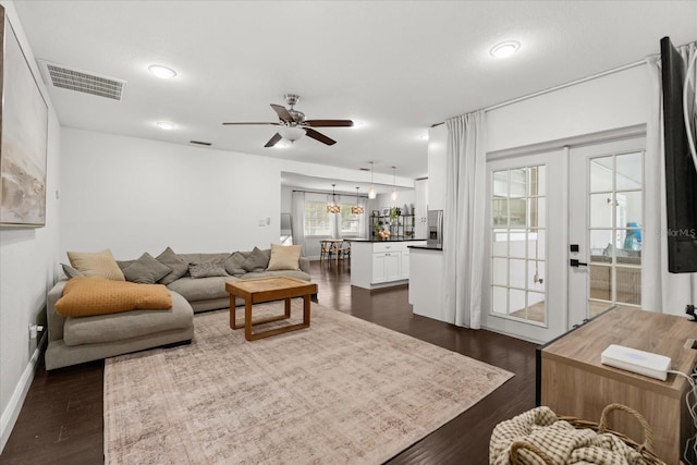736 Forest Glen Ct, Maitland, FL 32751 - living room with ceiling fan and dark wood-style flooring