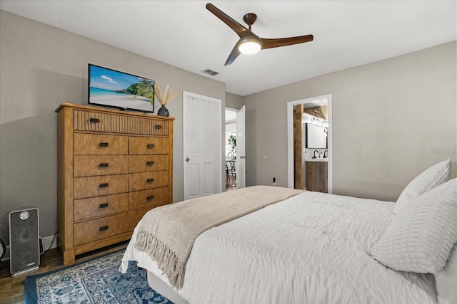 736 Forest Glen Ct, Maitland, FL 32751 - bedroom featuring a ceiling fan, ensuite bath, and wood finished floors